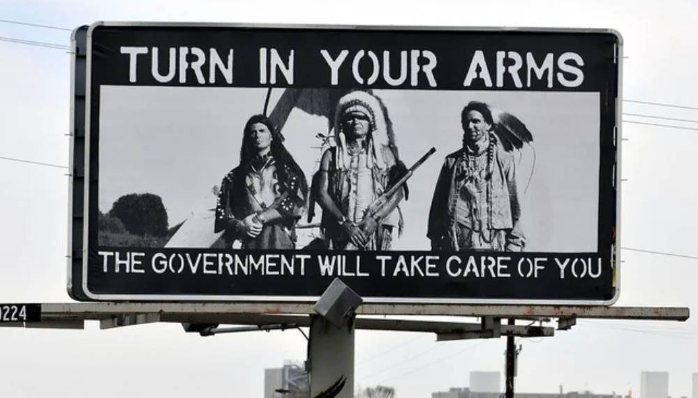 government will take care of native indians sign board